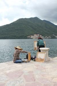 Artists painting the church and stunning scenery